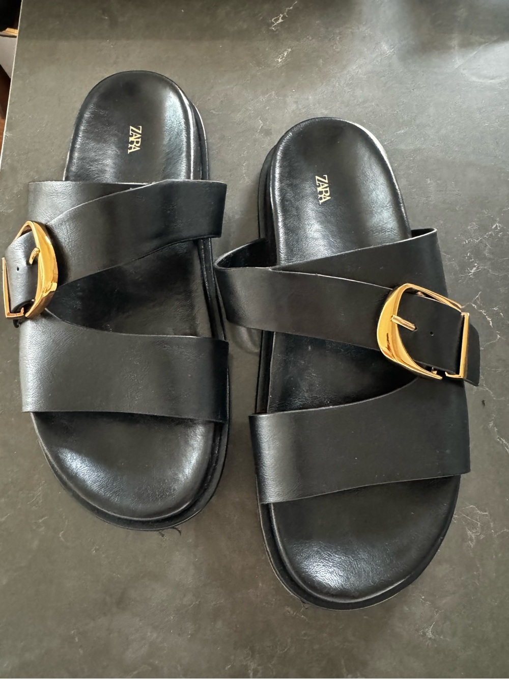 Black buckle flat sandals